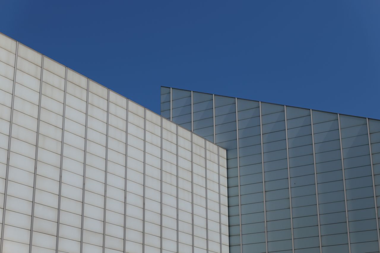 A building in front of a blue sky