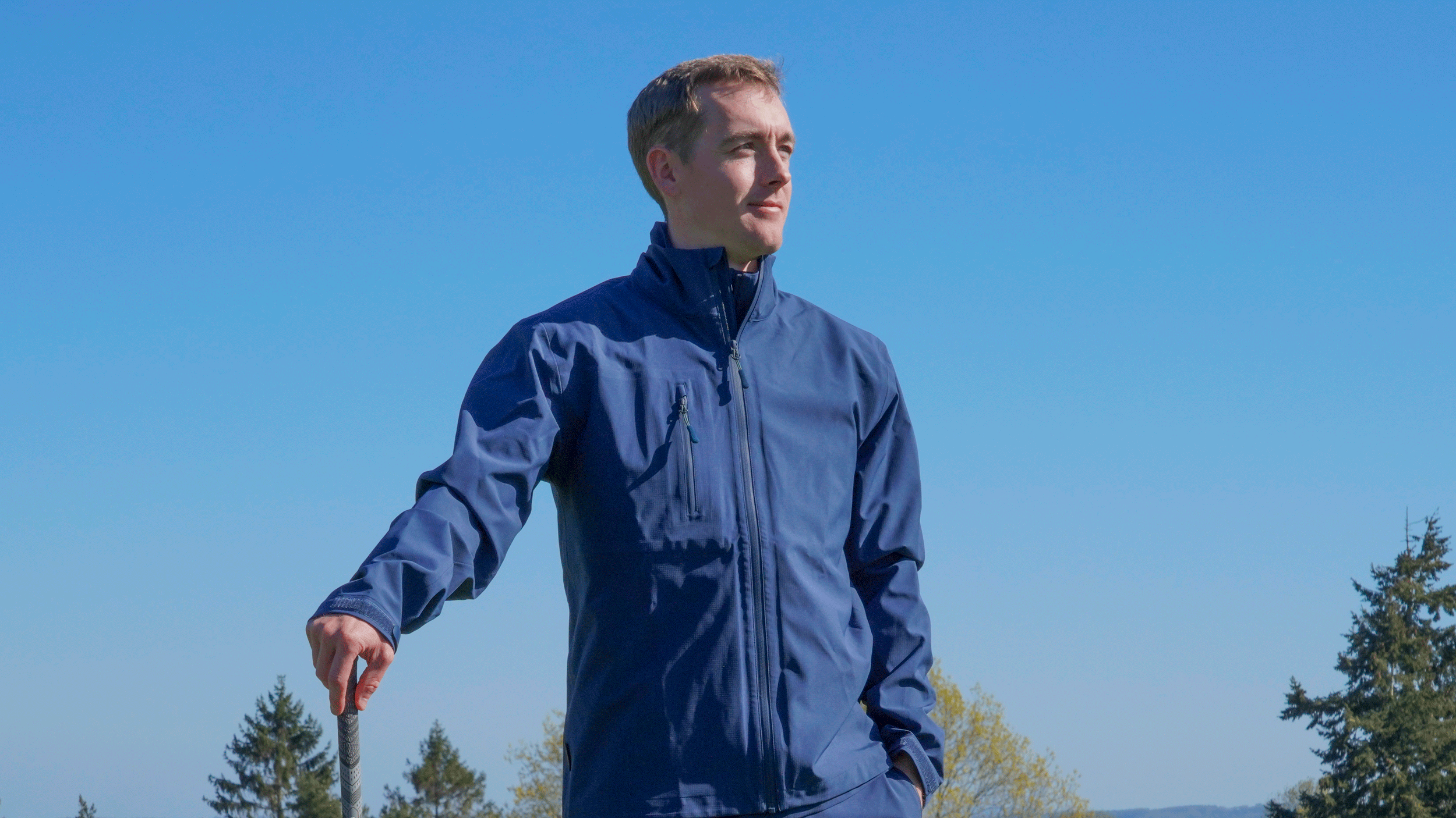 Jonny Leighfield rocking a navy blue HLINC rain jacket