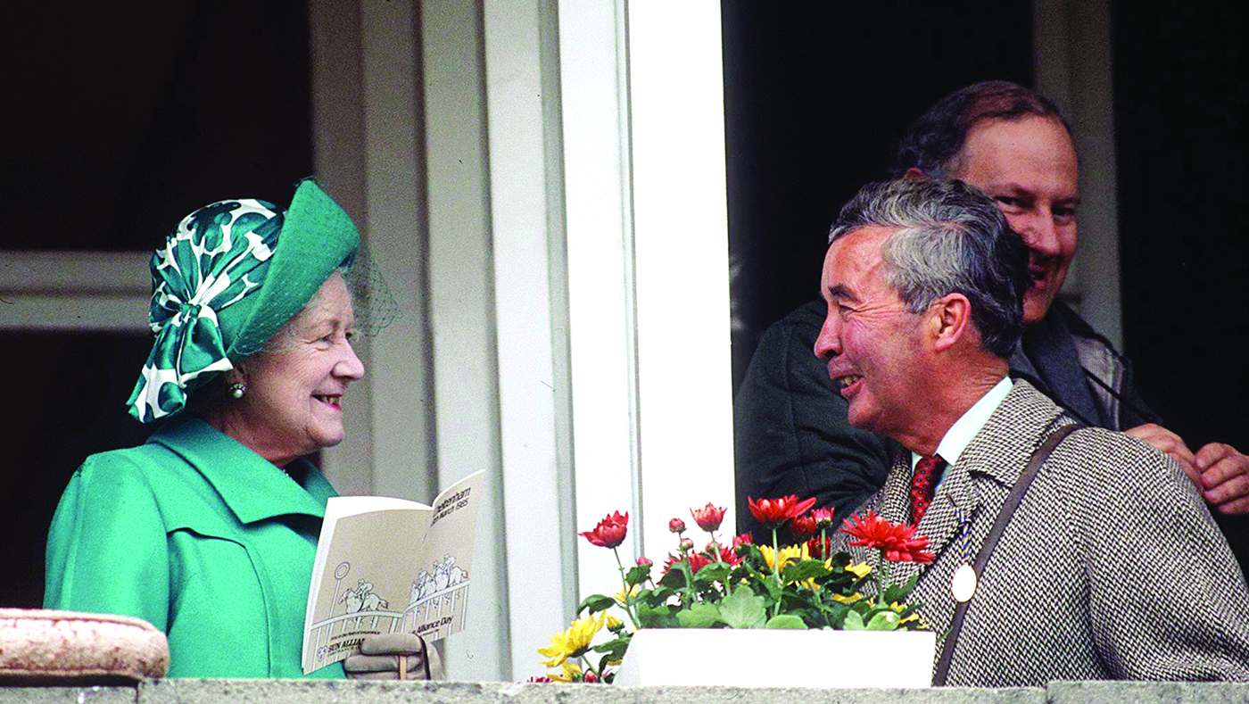 CHELTENHAM, UNITED KINGDOM - MARCH 13: Queen Mother With Dick Francis At Cheltenham Races. (Photo by Tim Graham Photo Library via Getty Images)