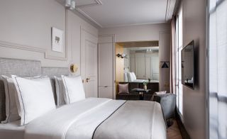 Maison Armance hotel guestroom with a blush pink interior in Paris, France