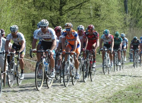 Bernhard Eisel (HTC-Highroad), Thor Hushovd (Garmin-Cervelo), Sebastian Langeveld (Rabobank) and Alessandro Ballan (BMC) make their way through Arenberg