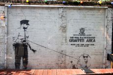 Banksy Stencil Graffiti outside the Cargo Club, Rivington Street, Shoreditch, London. Credit: Alamy