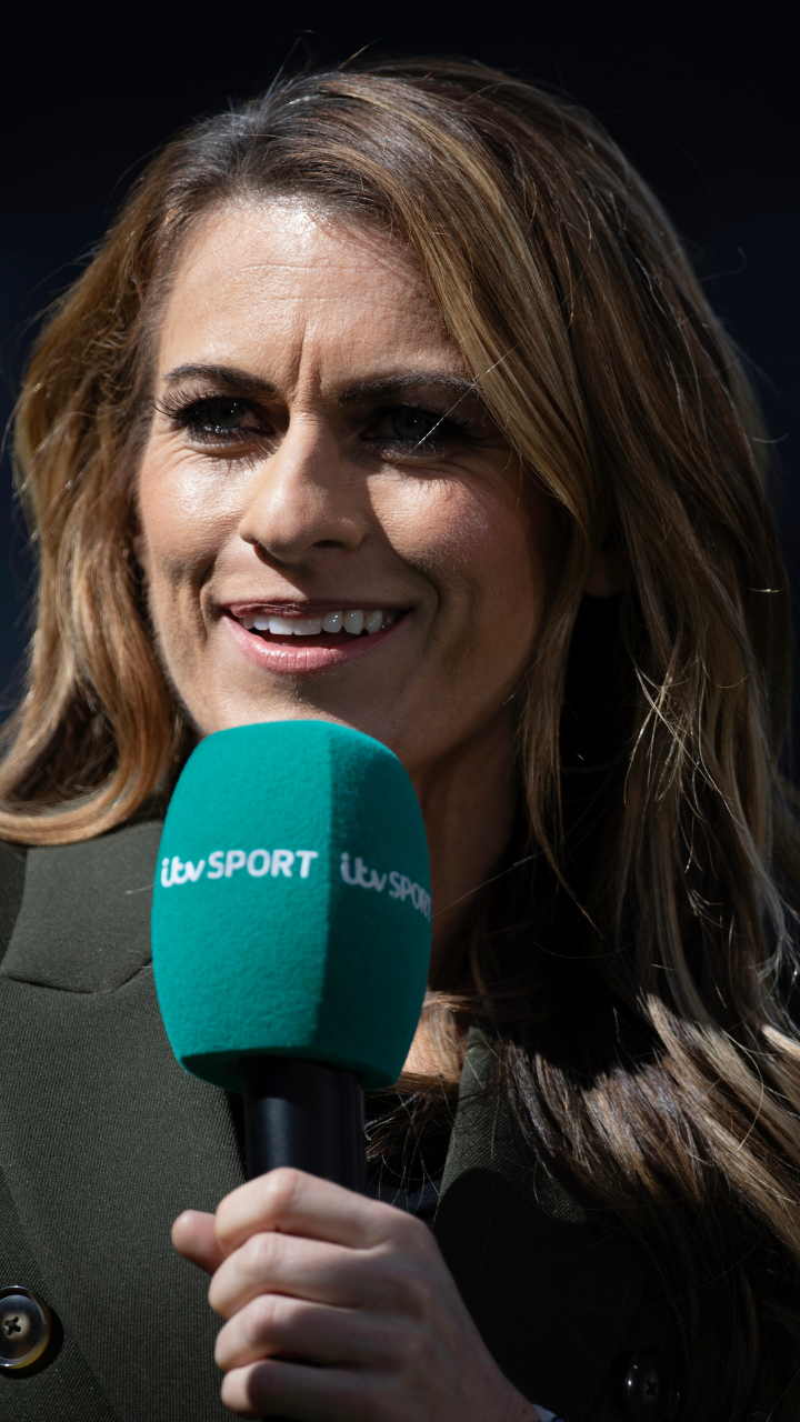 Karen Carney with a microphone commentating for ITV Sport