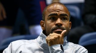 England Under-20 coach Kieron Dyer looks on during a game against Italy in 2018.
