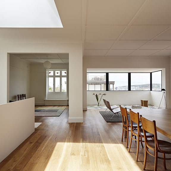 Tomek Archer Manly House with dining table and chairs