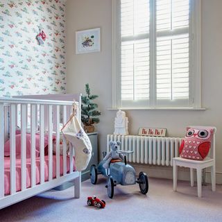 nursery room with crib