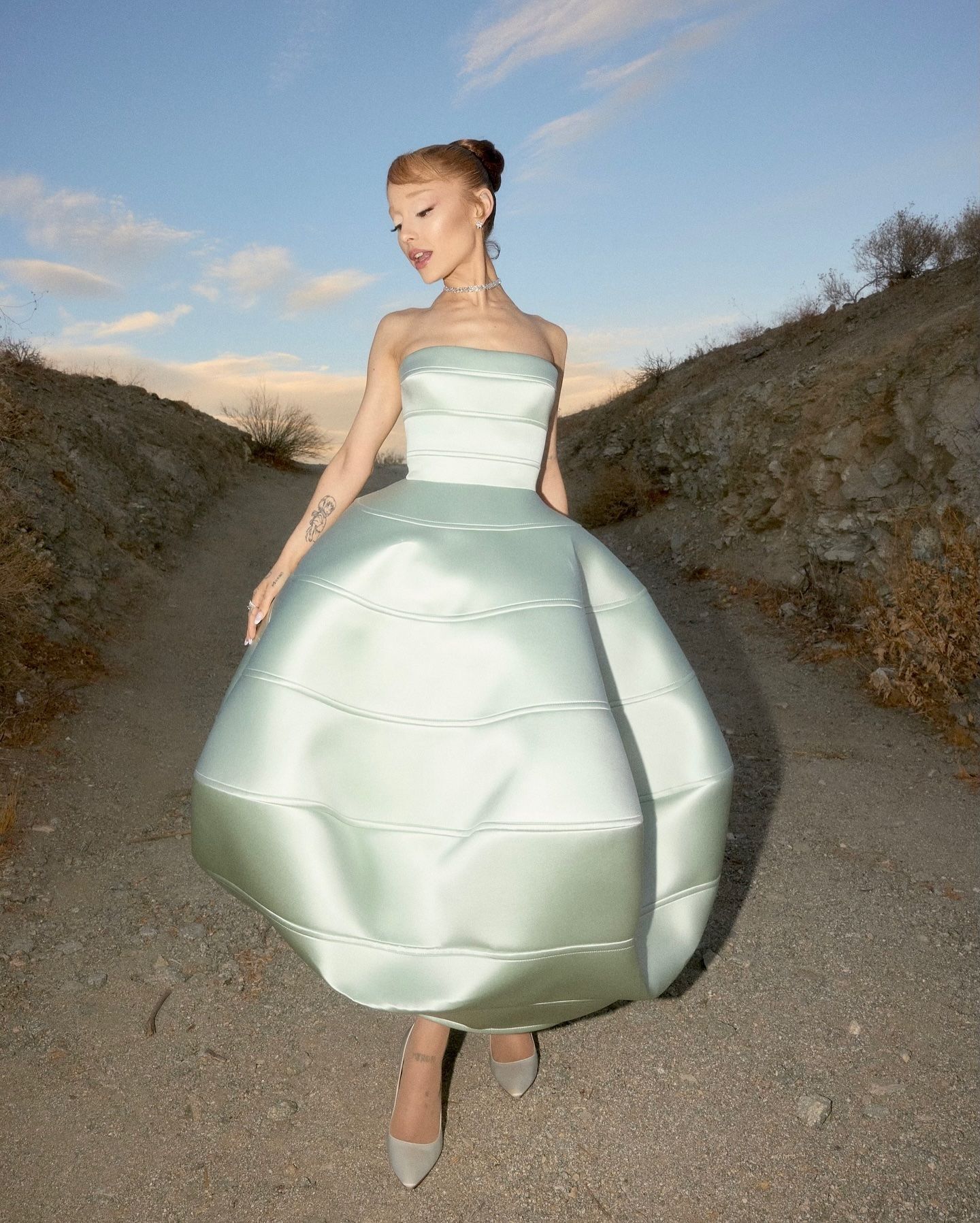 An image of Ariana Grande wearing a skirt for petites.