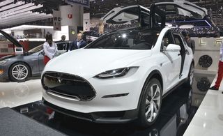 White Tesla interior is dominated by a dashboard that is like a super-sized iPad