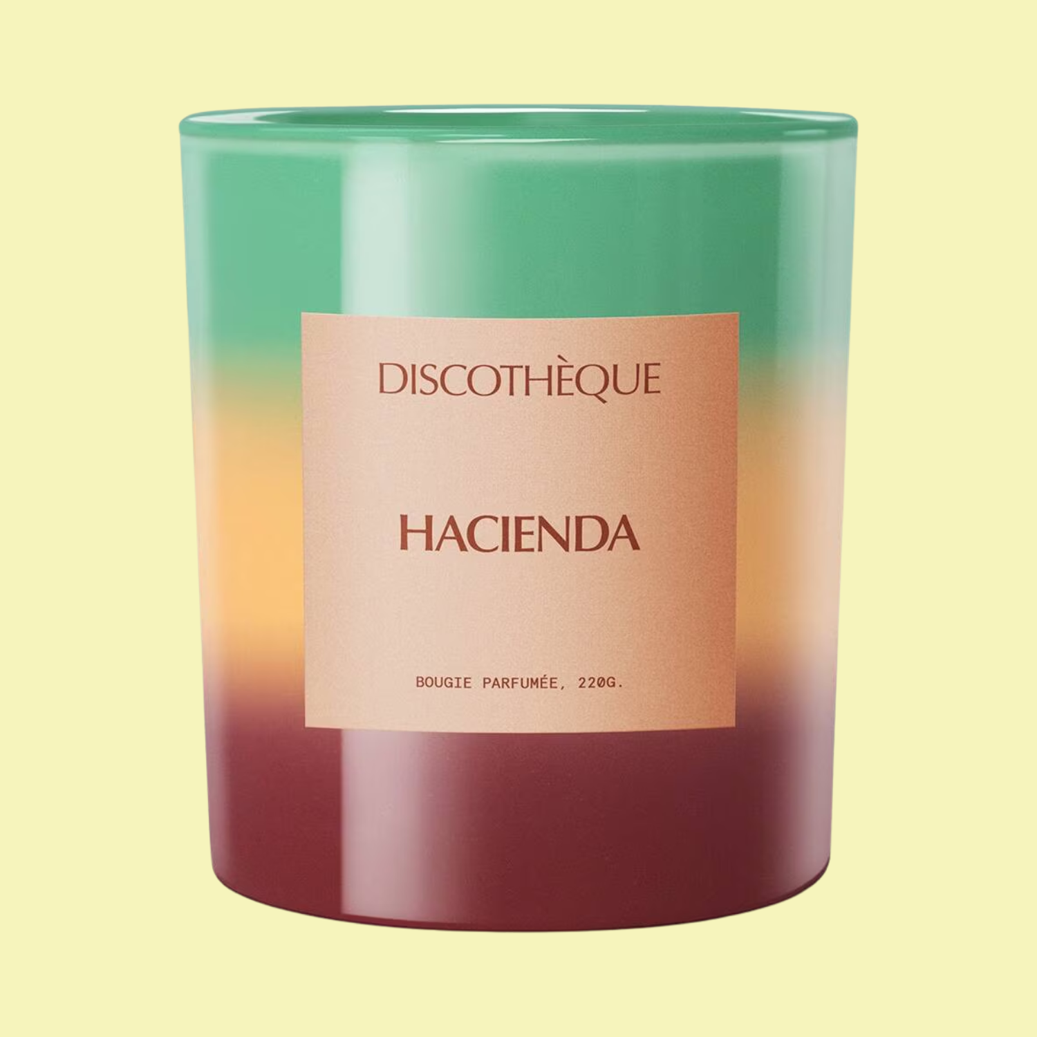 A green, yellow and brown candle