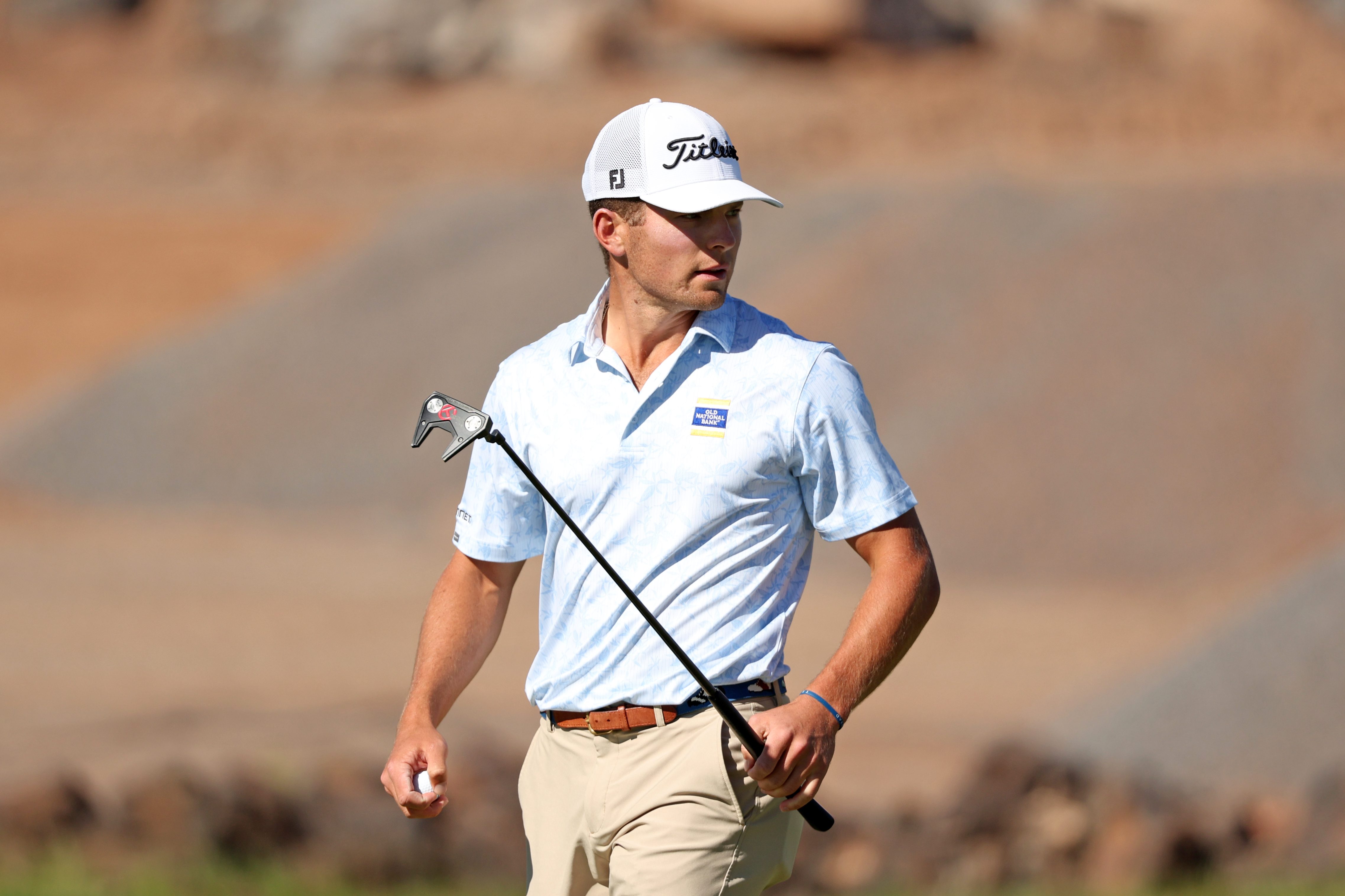 Michael Brennan watches his putt
