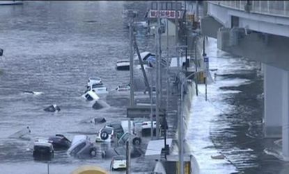 Video footage shows the area in northeastern Japan hit by the tsunami that followed the 8.8 magnitude earthquake Friday.