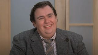 John Candy staring at a mole and his eyes go big in a screenshot from Universal Pictures' Uncle Buck.