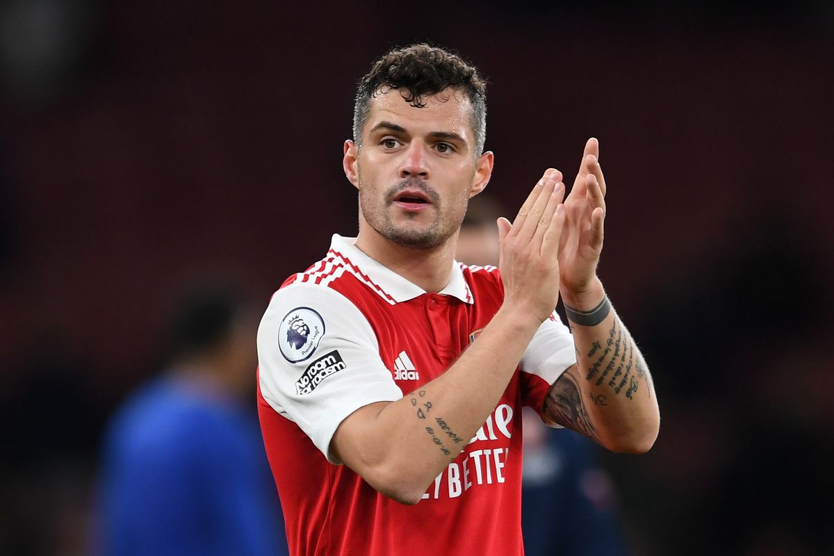 Arsenal star Granit Xhaka applauds the fans