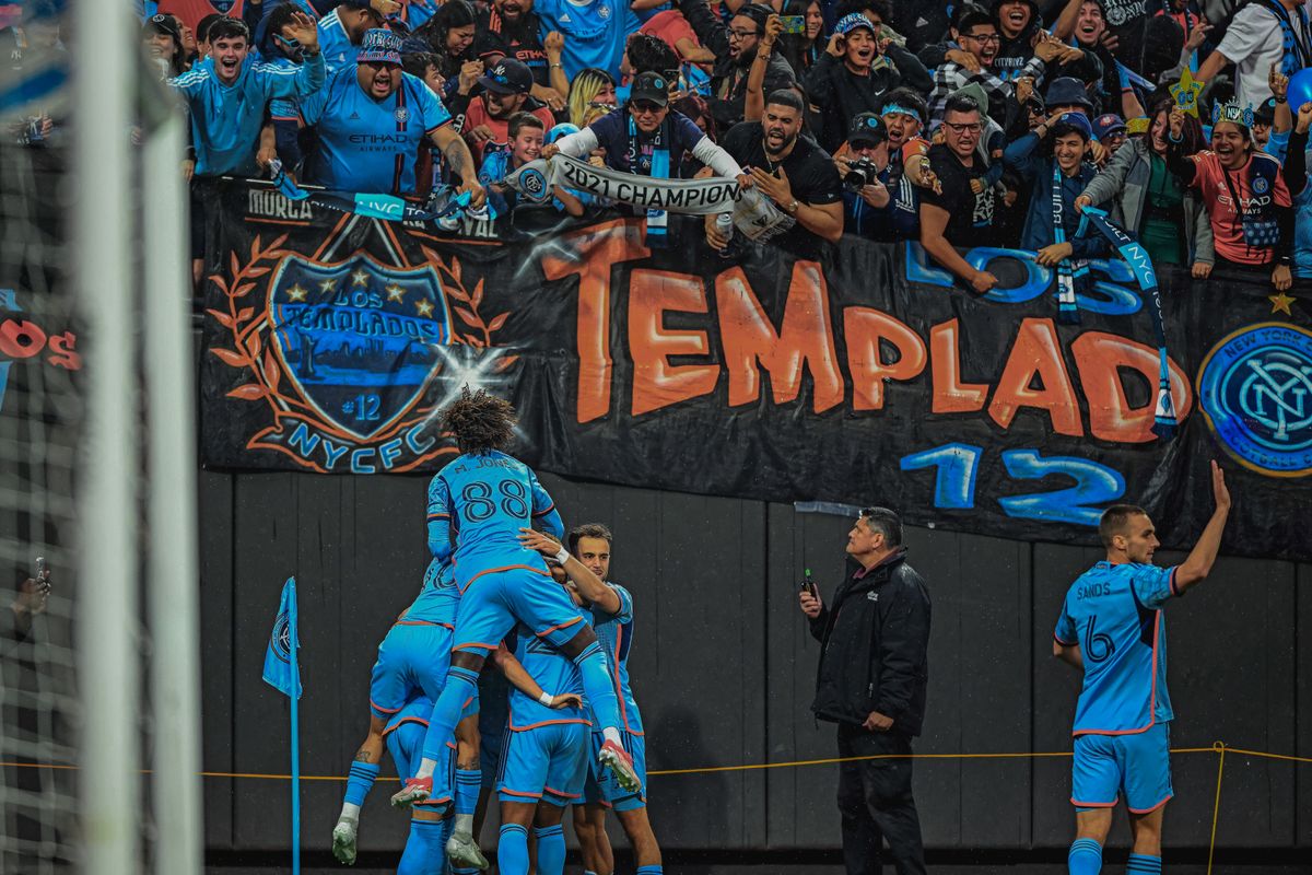 New York City's Hannes Wolf is mobbed by his team-mates after scoring an early goal in the Hudson River Derby at Citi Field Stadium Queens