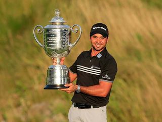 Jason Day beat Jordan Spieth by three strokes to set the best ever score-to-par in a major championship and claim his first major title. Credit: David Cannon (Getty)