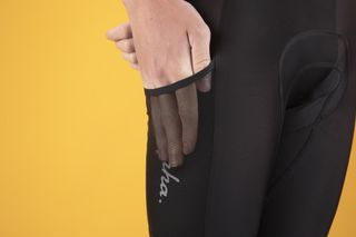 Hand in the pocket of Rapha core cargo bib shorts