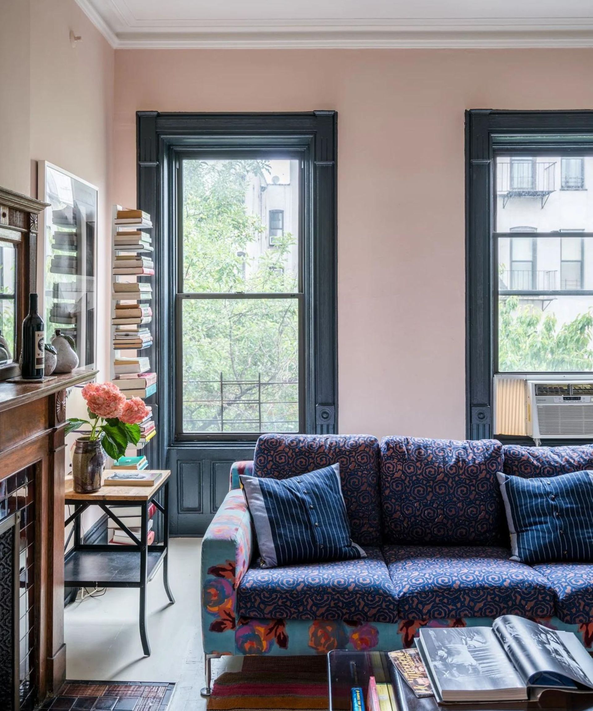 Pink living room with dark blue accents