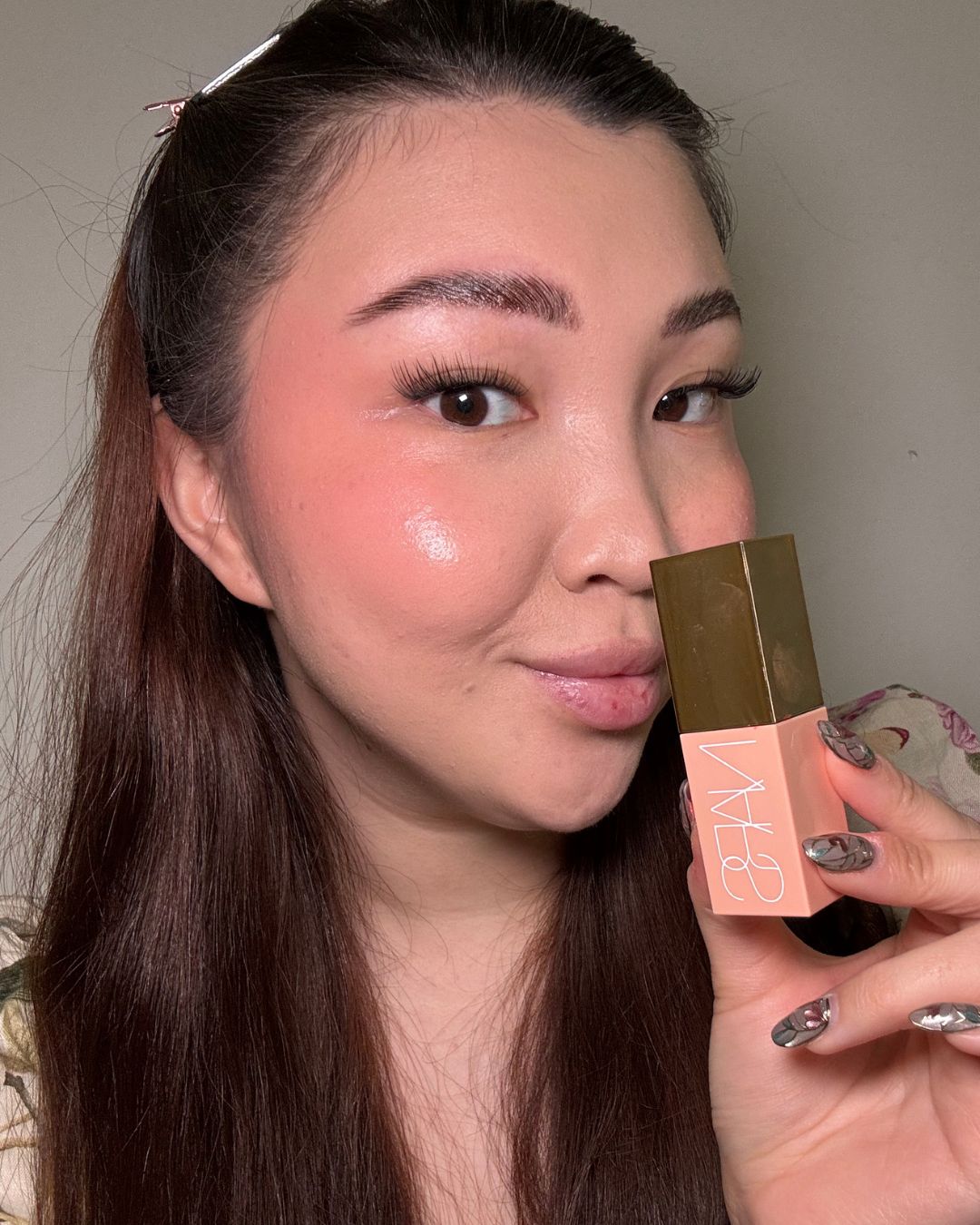 Denise Primbet testing the NARS Afterglow Liquid Blush