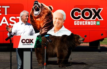 John Cox and Tag the bear.