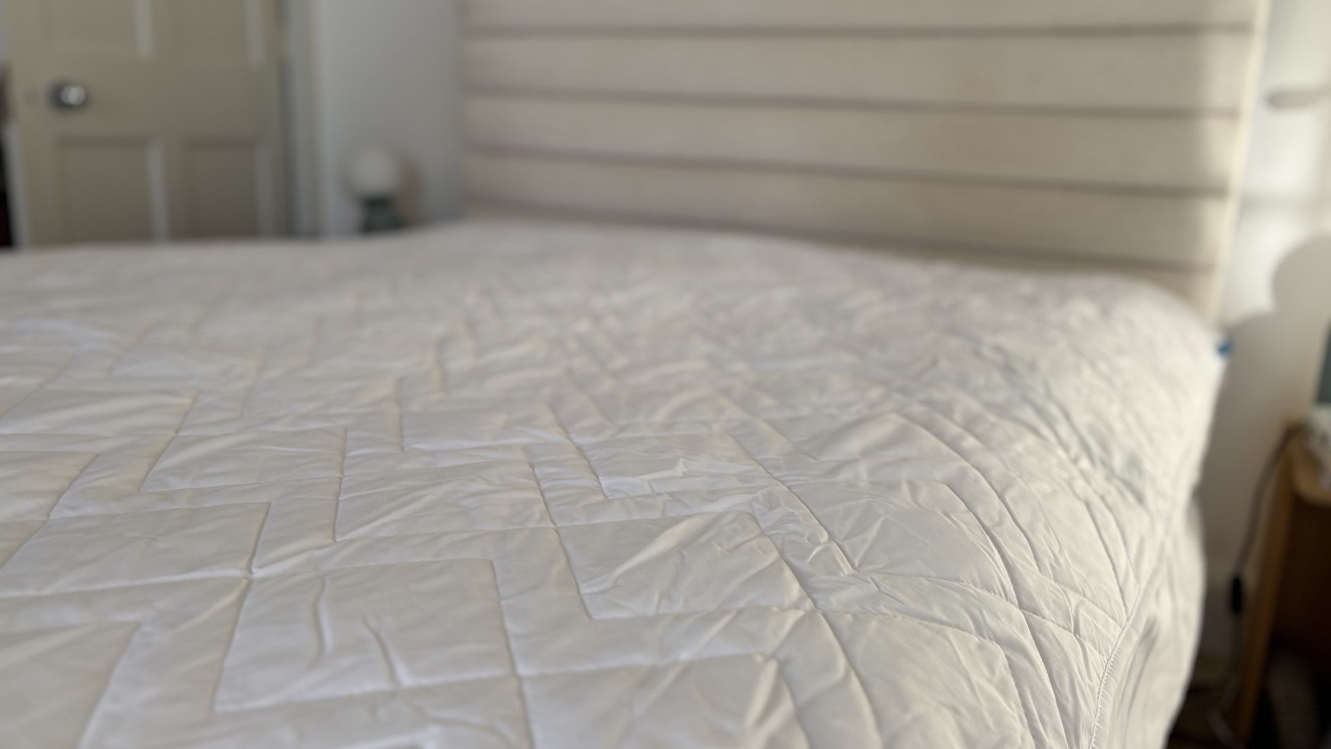 Simba Performance Mattress Protector being tested, on the bed