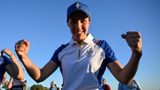 Carlota Ciganda celebrates after winning her four-ball match on the second day of the 2023 Solheim Cup