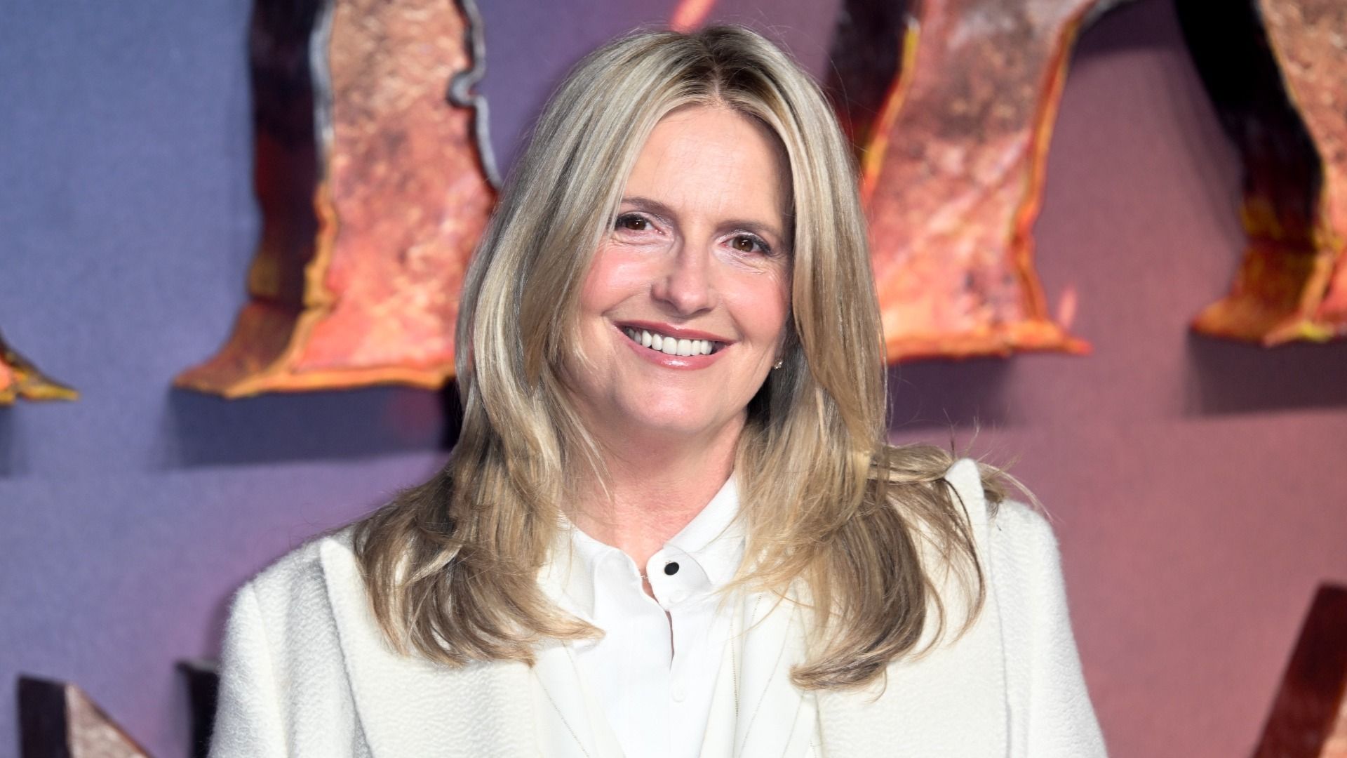 Penny Lancaster’s floaty slip dress and Birkenstocks pairing delivers effortless hot weather dressing