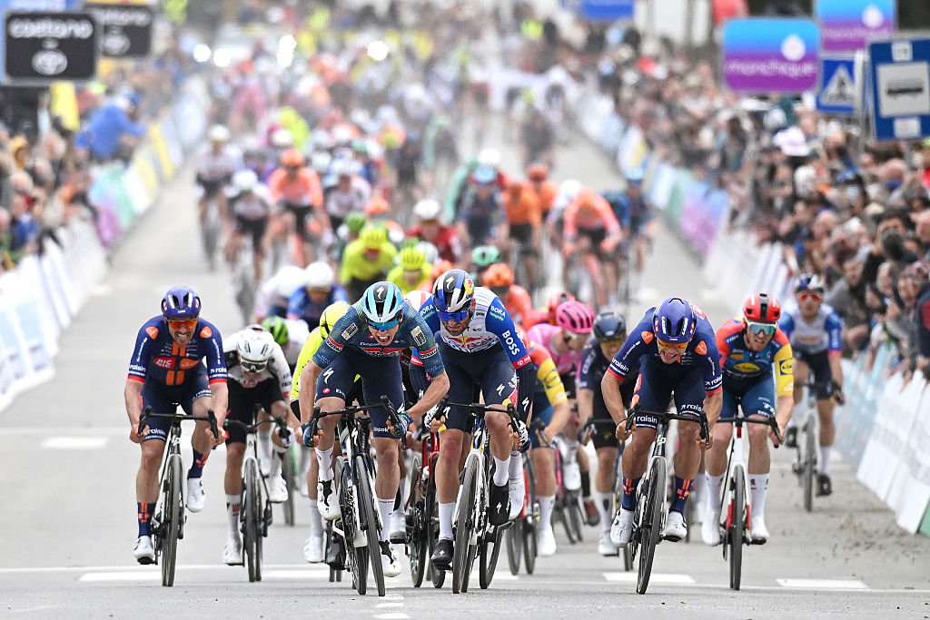 TAVIRA, PORTUGAL - FEBRUARY 18: Stage winner Paul Magnier of France and Team Soudal Quick-Step, Jordi Meeus of Belgium and Team Red Bull - BORA - hansgrohe and Pavel Bittner of Czech Republic and Team Picnic PostNL sprint at finish line during the 52nd Volta ao Algarve em Bicicleta 2026 - Stage 1 a 183.5km stage from Vila Real de Santo Antonio to Tavira on February 18, 2026 in Tavira, Portugal. (Photo by Dario Belingheri/Getty Images)