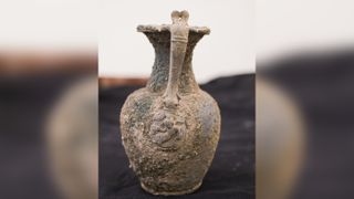 Here, a jug that would have held wine some 1,900 years ago.