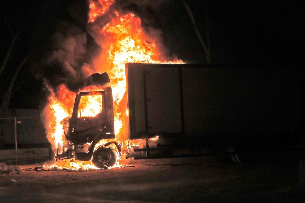 A truck on fire in Lod, Israel.