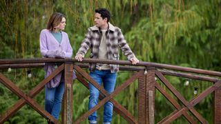 Aimee Teegarden, Benjamin Hollingsworth on a bridge in An Easter Bloom