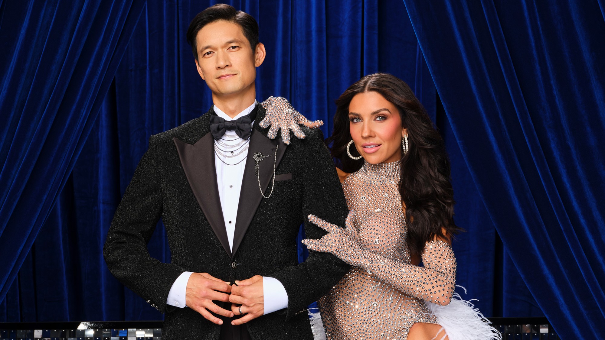 Harry Shum Jr. and Jenna Johnson posing for Dancing with the Stars.