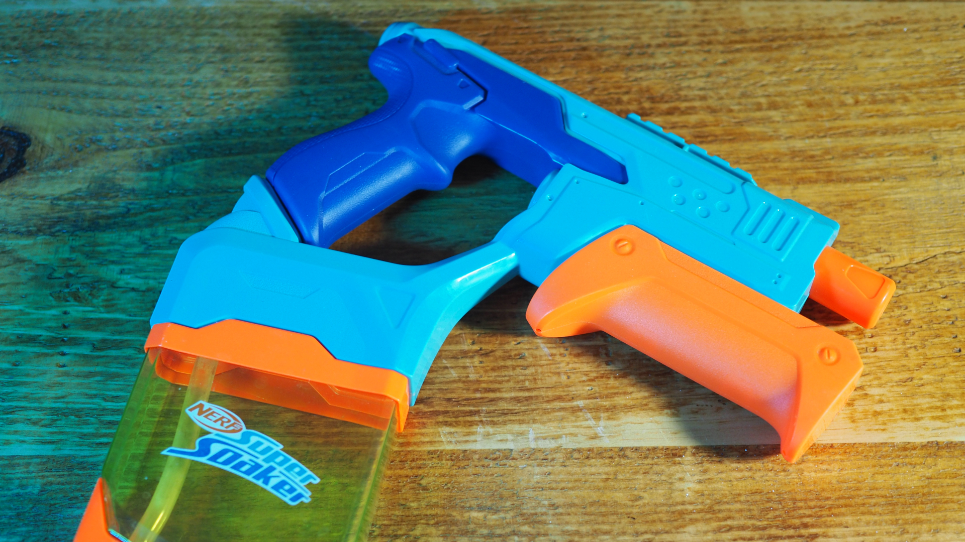 Super Soaker Dunk-Fill 2-Pack on a wooden table