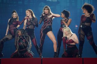 Taylor Swift performs onstage at the Eras Tour