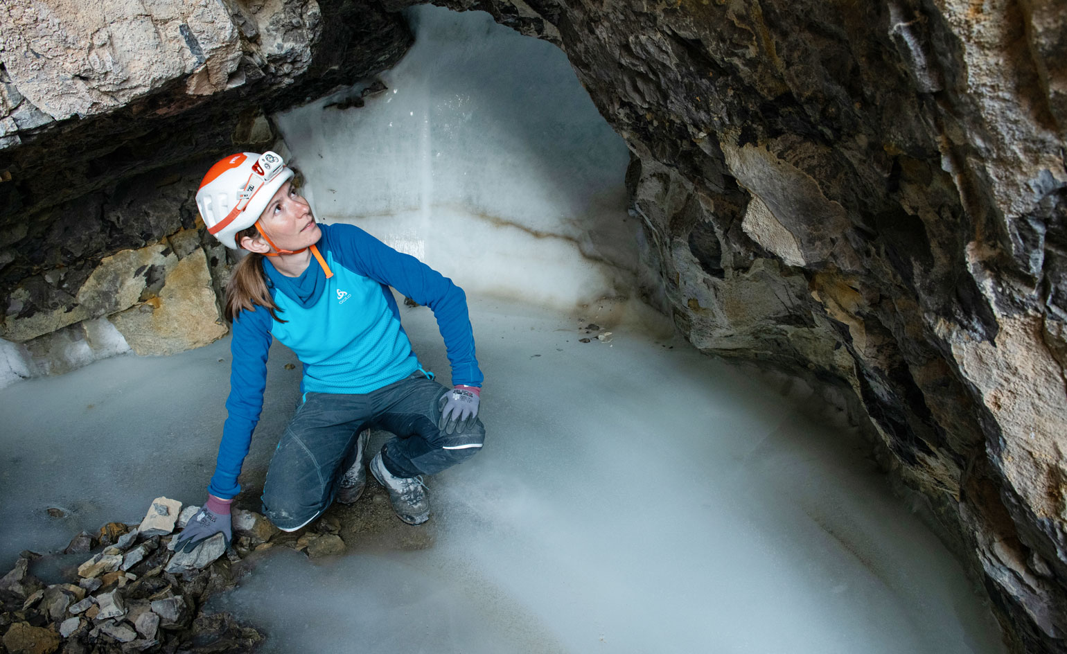 Woman underground in cave
