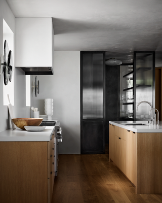 A kitchen with wooden materials