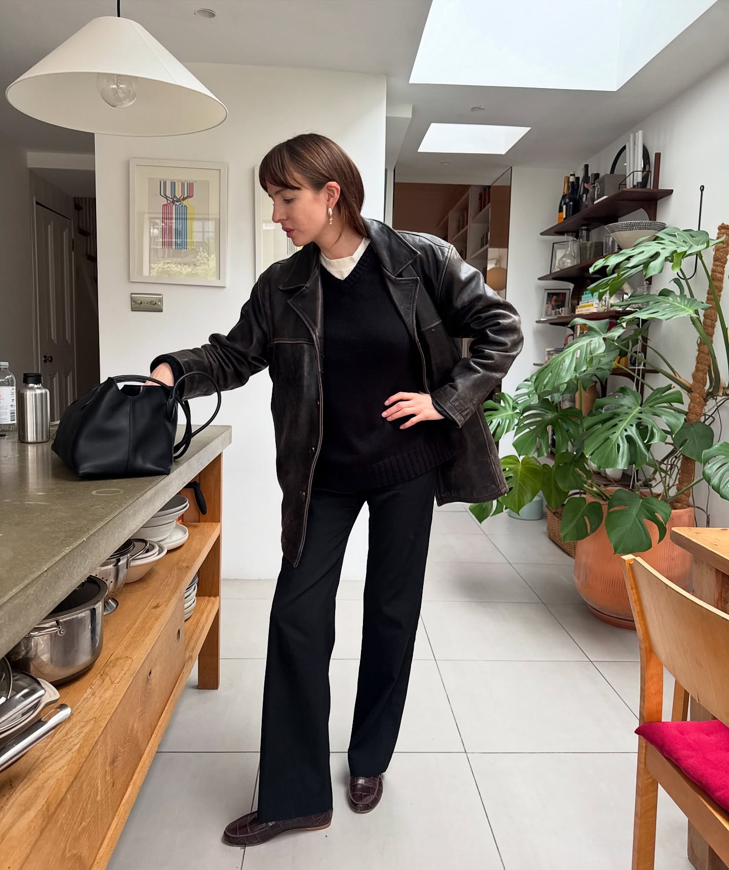 Lizzy in a boxy leather jacket