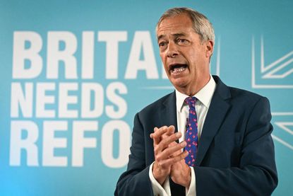 Nigel Farage launches the Reform UK manifesto in Merthyr Tydfil, south Wales (Photo by JUSTIN TALLIS/AFP via Getty Images)