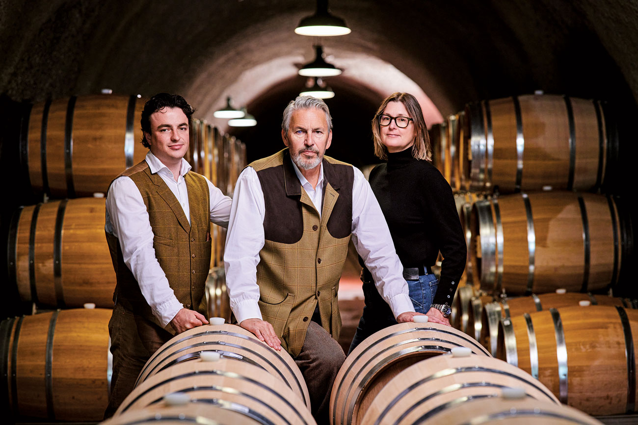 Jayson Woodbridge with son Cameron (left) and wife Helen