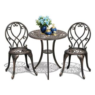 A Cobana 3 Piece Bistro Set - two aluminium chairs and table in a French style