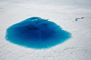 Supraglacial lake on ice sheet.