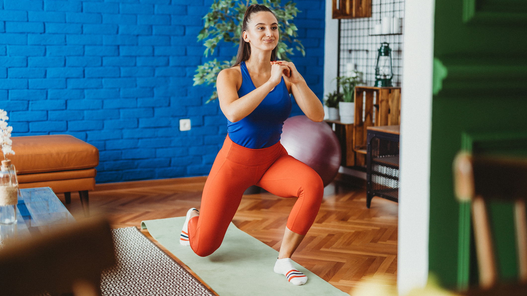 Woman performing lunge exercise at home