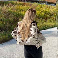 @michellerosedrumm with long, blonde hair