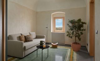 lounge interior of restored house in Sicily, part of Airbnb rent-free scheme