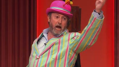 David Mitchell performs a musical number