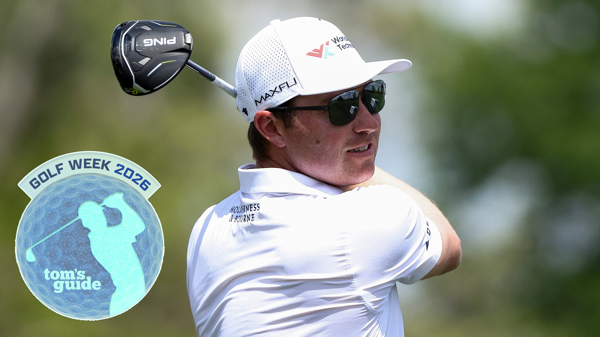 Ben Griffin following through on a drive with a Golf Week Badge to his left