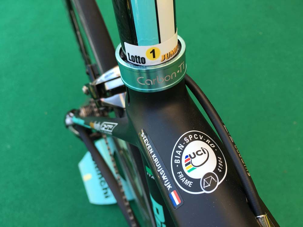 The mechanics mark the precise height of Kruijswijk's seatpost which is held in place by a carbon-Ti clamp