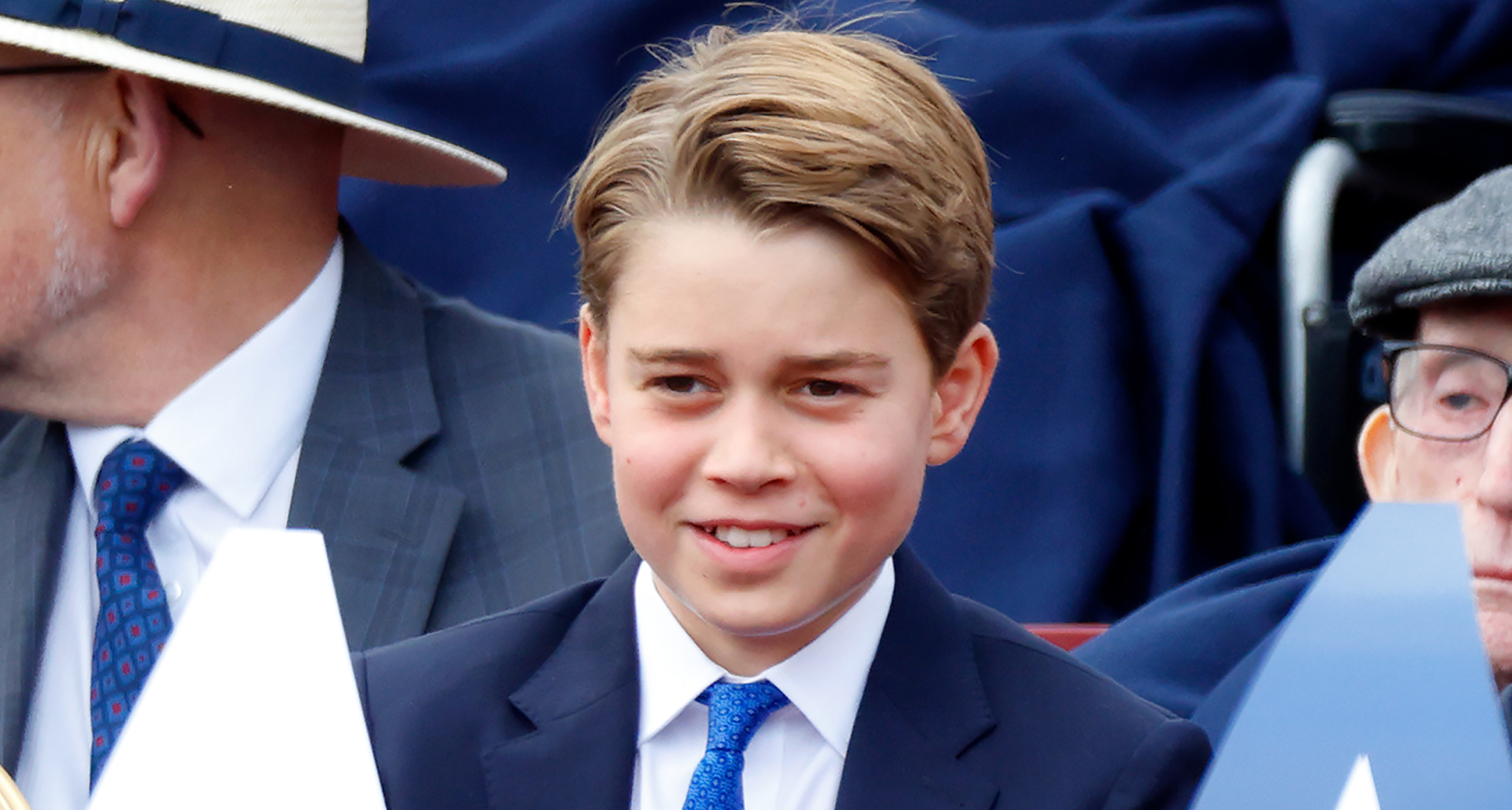 Prince George in a suit and tie
