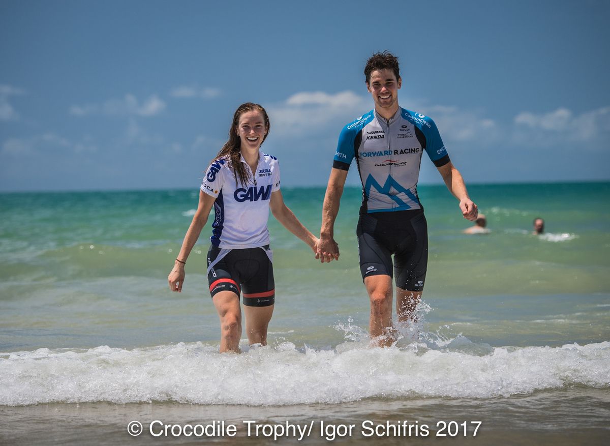 Haley Smith and Andrew L'Esperance enjoying a dip in the ocean