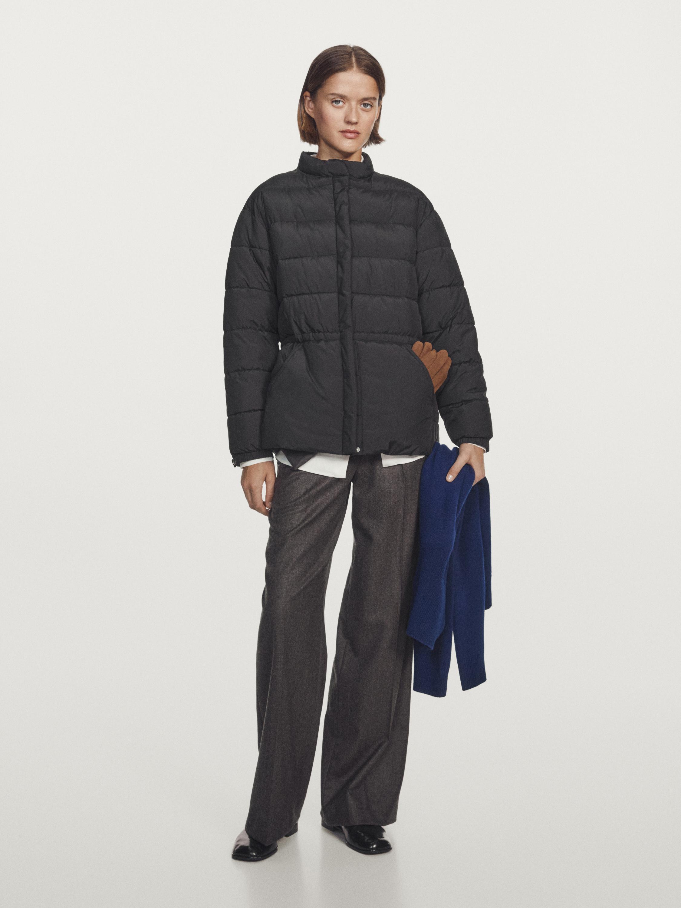 a model wearing a fitted puffer jacket from massimo dutti