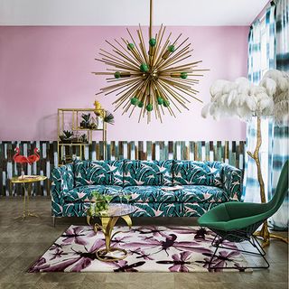 living room with geometric chandelier bright colours and an unashamedly confident mix of patterns